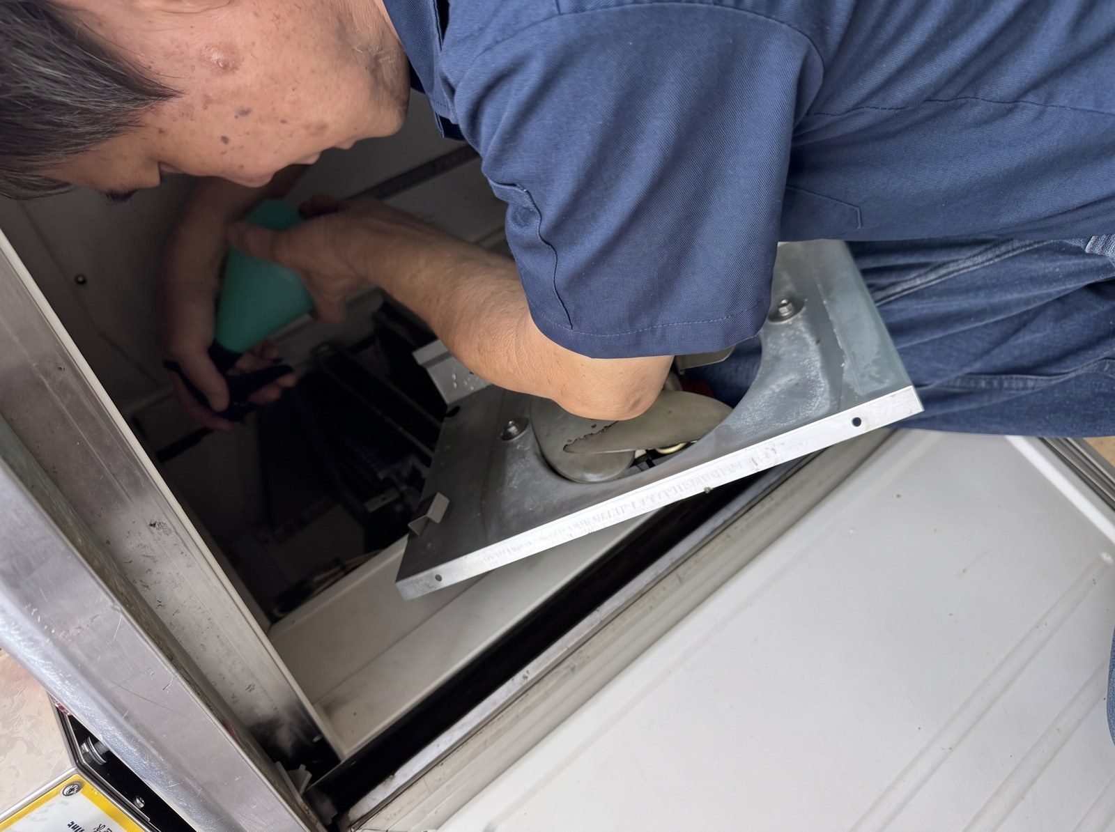 Alan working on a commercial refrigeration unit