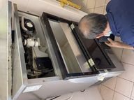 Alan Law checking an opened stainless steel counter unit